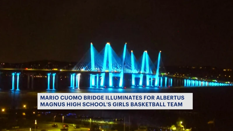 Story image: Mario Cuomo Bridge lit up with Albertus Magnus HS colors to celebrate championship