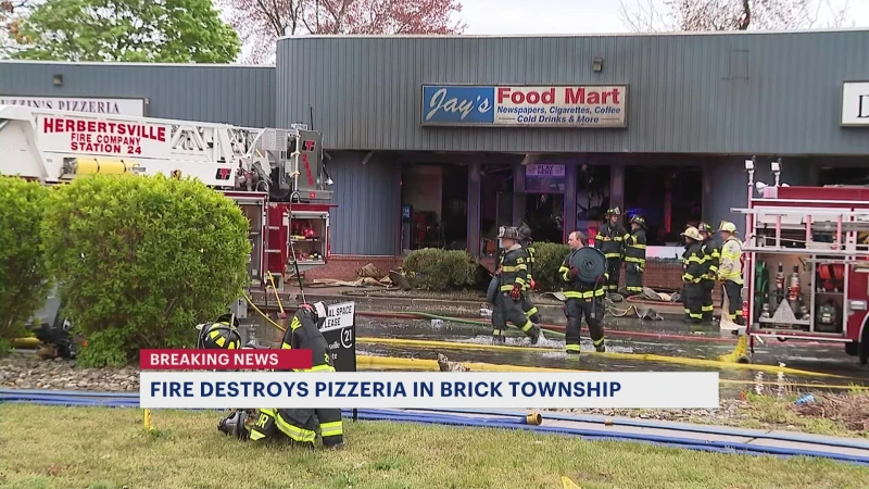 Story image: Officials: 3-alarm fire destroys 2 Brick Township strip mall businesses