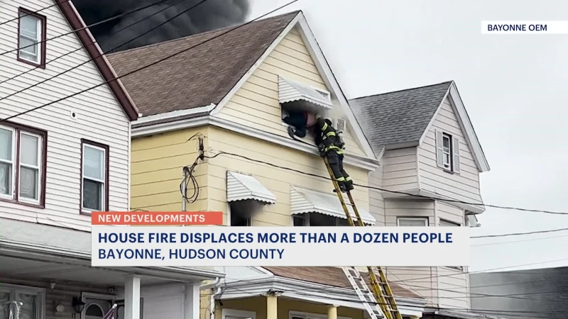 Story image: Bayonne firefighter rescues man trapped in burning home; 16 people displaced