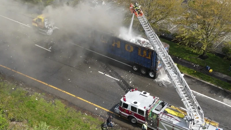 Story image: Recycling truck goes up in flames, shuts down part of Long Island Expressway 