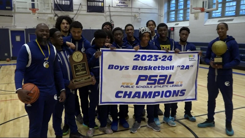 Story image: South Bronx Prep hangs another title banner in their gym 