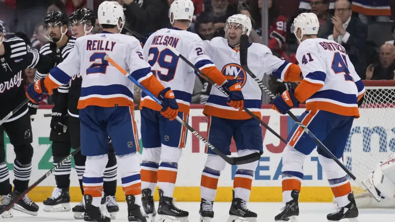 Story image: The New York Islanders clinch a playoff spot in the Eastern Conference with 4-1 win over Devils