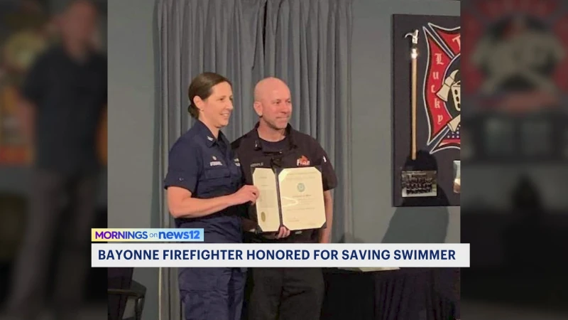 Story image: Bayonne fire captain honored for saving swimmer in Virginia