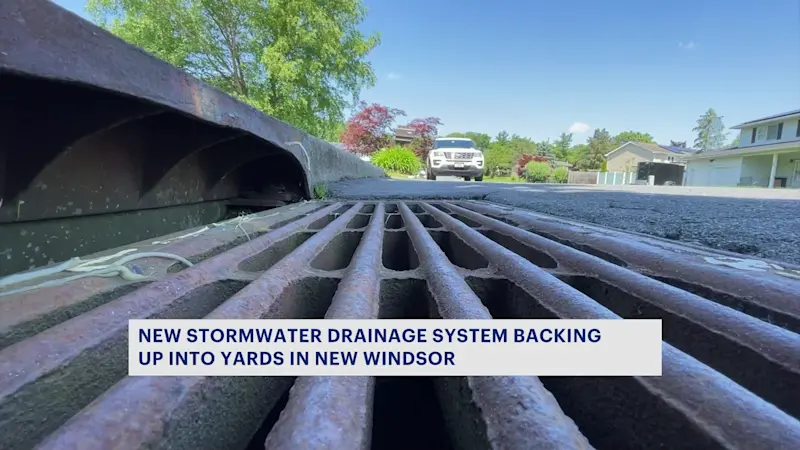 Story image: New drainage project in New Windsor tested by downpour; may need fix