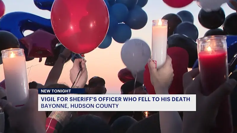 Story image: Balloon vigil held for Hudson County Sheriff’s Officer who died in fall