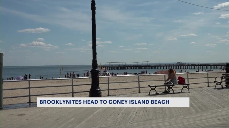 Story image: Beach lovers flock to Coney Island