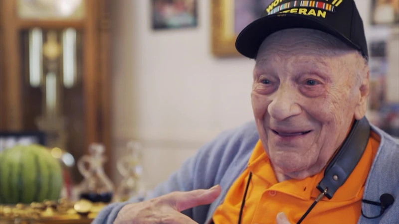Story image: 'I'd never thought I'd make it.' 103-year-old saxophonist, WWII vet from Floral Park reflects on birthday milestone