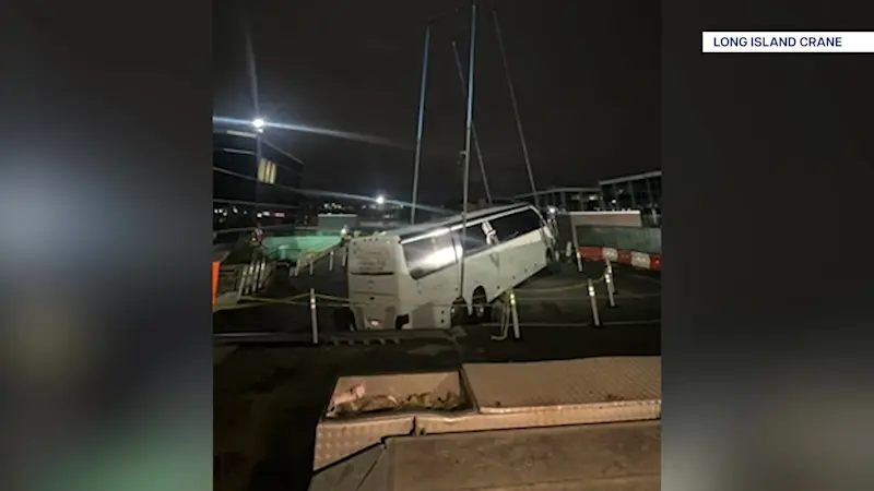 Story image: Town of North Hempstead Building Department removes partially collapsed bus from garage