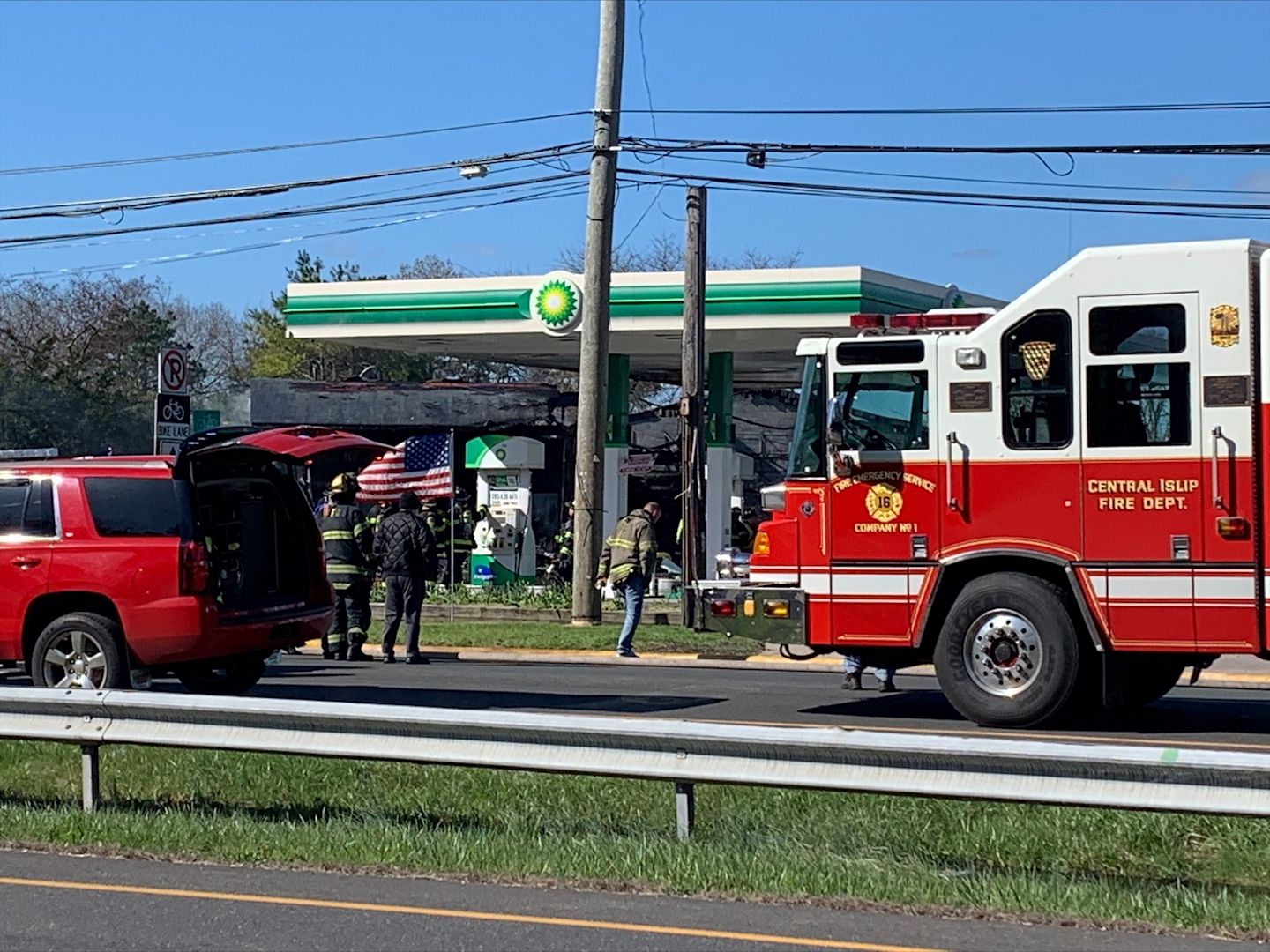 Fire breaks out at BP gas station in Islandia, adjacent building destroyed