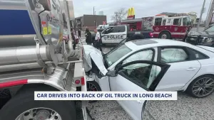 Car crashes into back of oil truck in Long Beach
