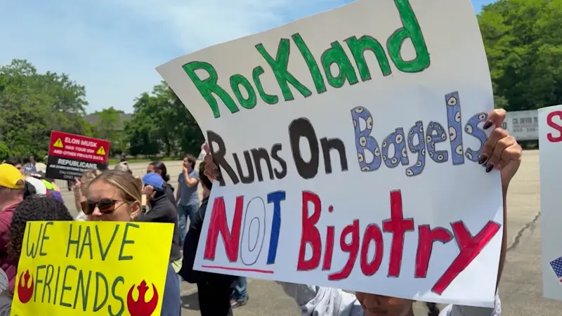 Story image: Intense moments outside Rockland Community College during Trump visit between protesters and counter-protesters
