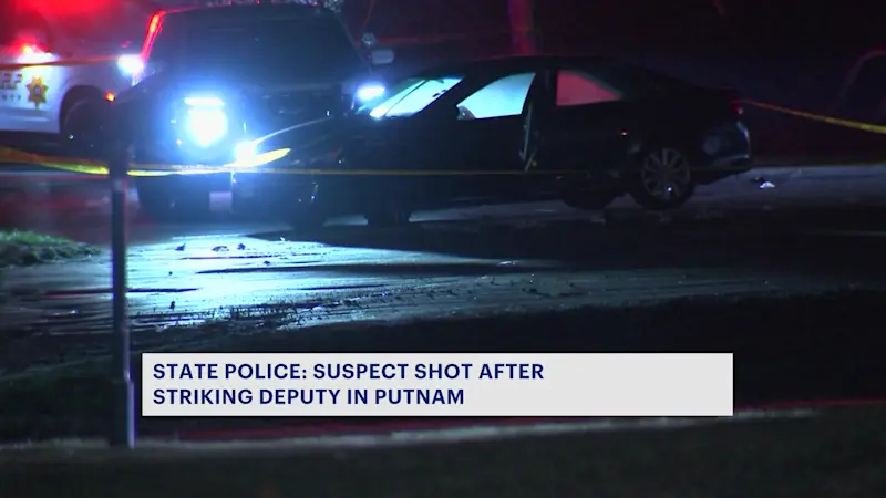 Story image:  Residents react to deputy shooting a suspect after being struck by a car in Putnam County