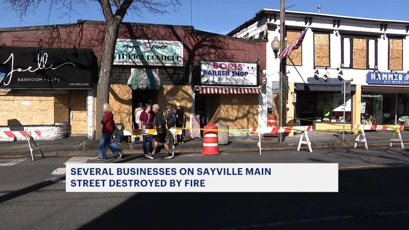 Story image: Wind-swept fire leaves several Sayville businesses boarded up