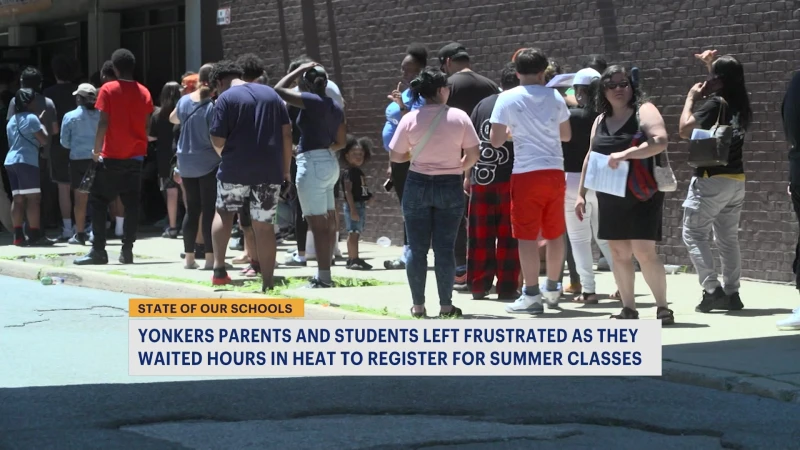 Story image: Yonkers parents and students wait for hours in the heat to register for summer classes