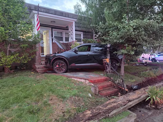 suv into home