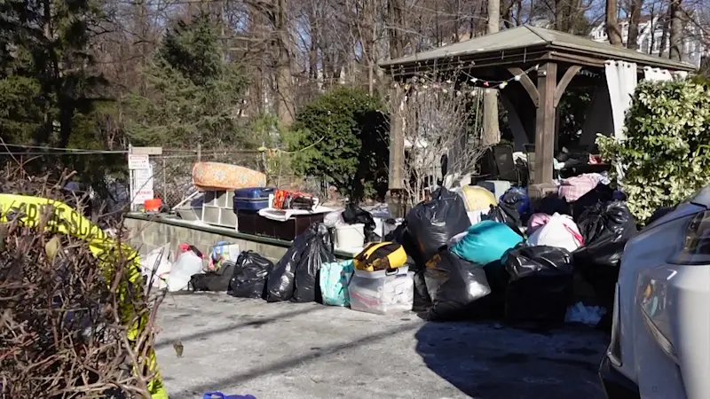 Story image: McLean Avenue fire fallout: Victims spend day salvaging belongings