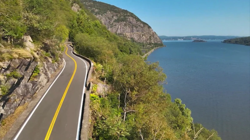 Story image: Storm King Highway reopens a year after destruction by historic storm