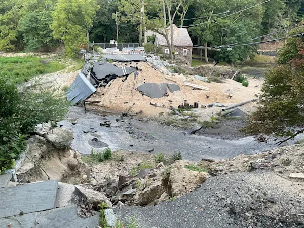 Story image: Head of the Harbor 'imminently' preparing lawsuit to force repairs to storm-damaged road and surrounding area one year later
