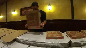 Pizza delivery driver attempts to break world record for fastest pizza box folding