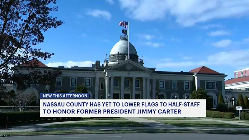 Story image: Some U.S. flags at Nassau buildings not at half-staff in honor of late President Carter