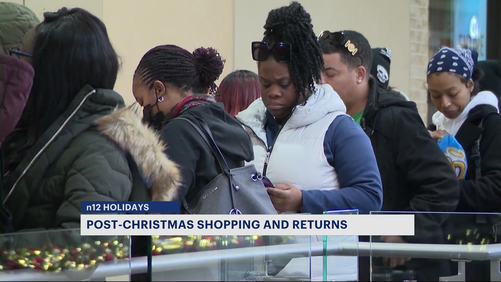 Shoppers Hit Stores To Spend Holiday Cash And Make Returns