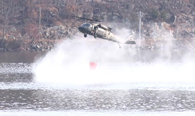 Story image: Wildfire latest: NY Army National Guard gives inside look at Blackhawks battling blaze