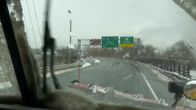 Story image: Mother Nature keeps road crews busy with snow on Christmas Eve