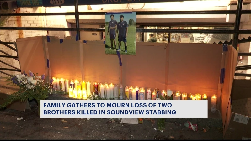 Story image: Community gathers for vigil to honor brothers who were fatally stabbed in Soundview