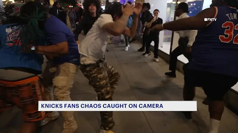 Story image: 21 people in custody, several injured after crowds spill into Manhattan streets following Knicks loss