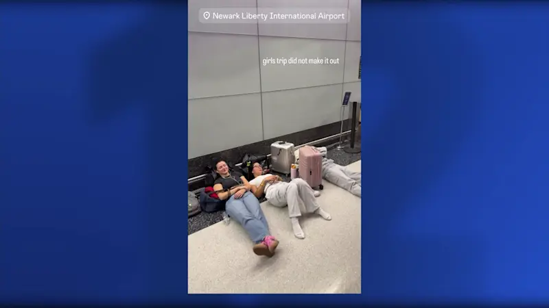 Story image: Family sleeps in Terminal B after flight cancellation at Newark