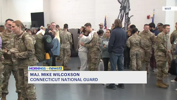 Tears and pride as Connecticut troops head overseas for yearlong mission