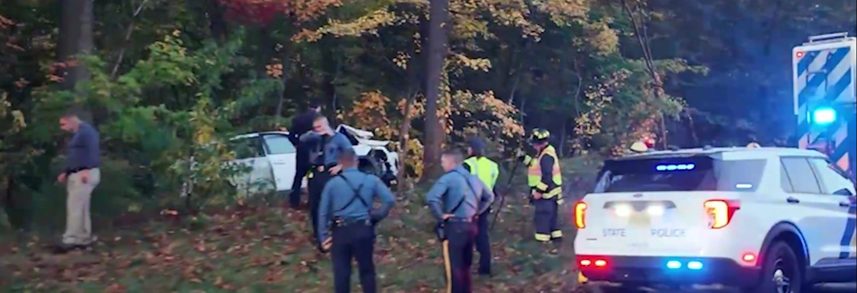 Car mangled after crashing into woods in Denville