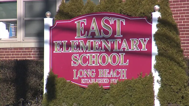 Story image: Parents celebrate decision to keep East Elementary School open