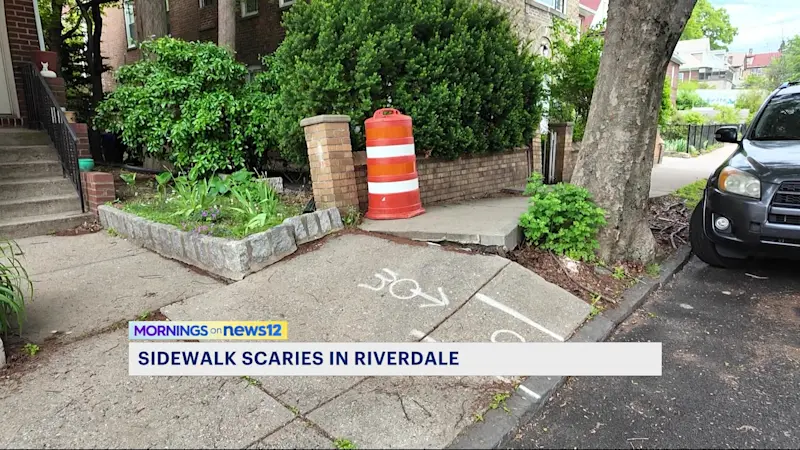 Story image: Sidewalk in Riverdale poses threat to pedestrian safety