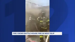 Officials: Fire engulfs home in West Islip