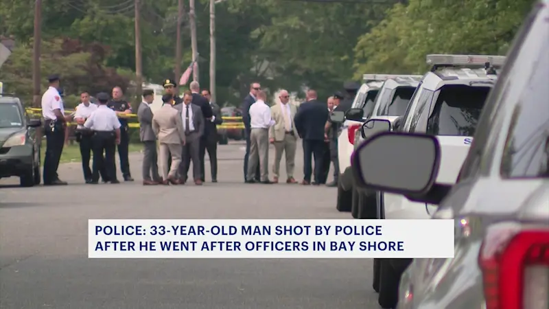 Story image: Police: Man shot by officers after advancing with sword in Bay Shore