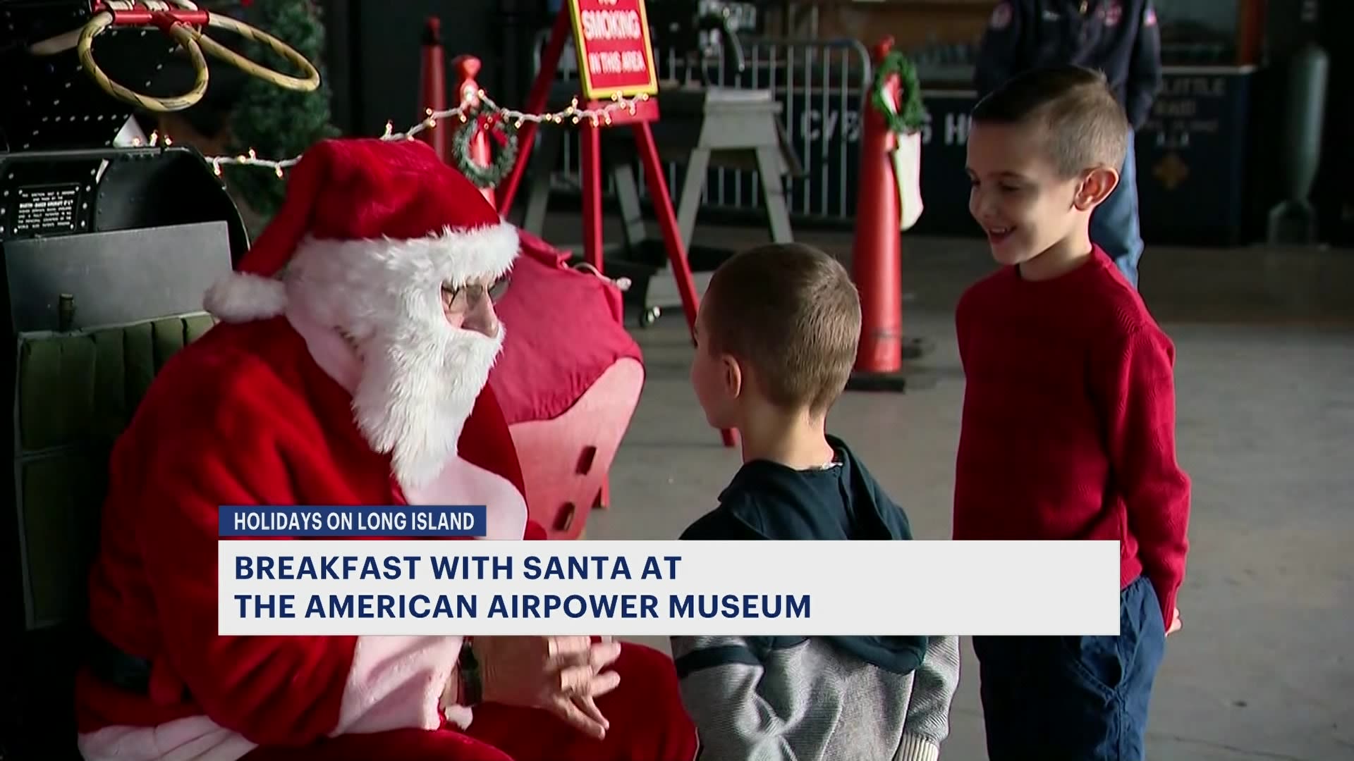 Families enjoy breakfast with Santa at the American Airpower Museum in