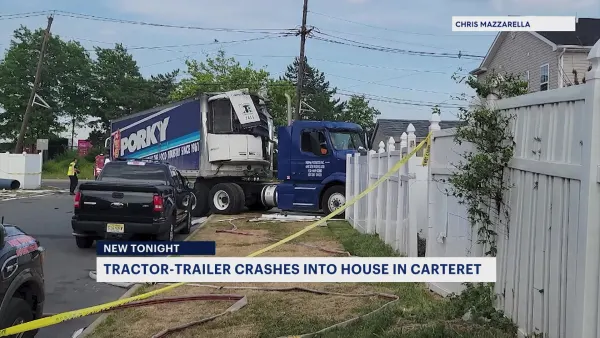 Tractor-trailer crashes into 2 Carteret homes, narrowly missing children at play
