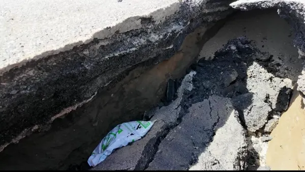 Country Club neighbors report large sinkhole near Fairmount, Clarence avenues