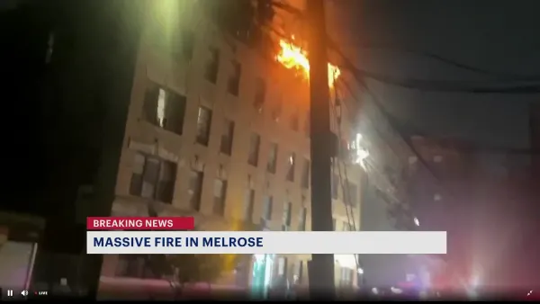 First responders work to subdue fire near Melrose Metro-North station