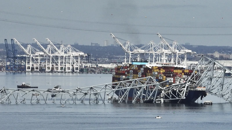 Story image: Baltimore bridge collapses after powerless cargo ship rams into support column; 6 presumed dead