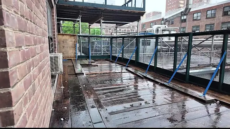 Story image: Trash pile removed from scaffolding outside NYCHA apartment in Brownsville