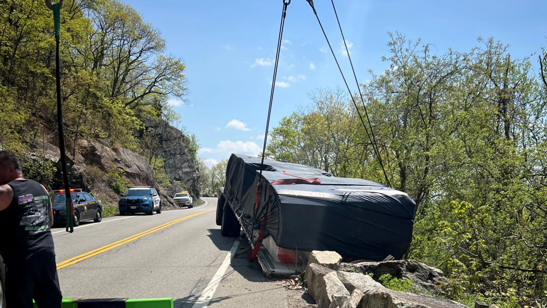 Road closed: Tractor-trailer left teetering after crash on Bear Mountain Bridge Road