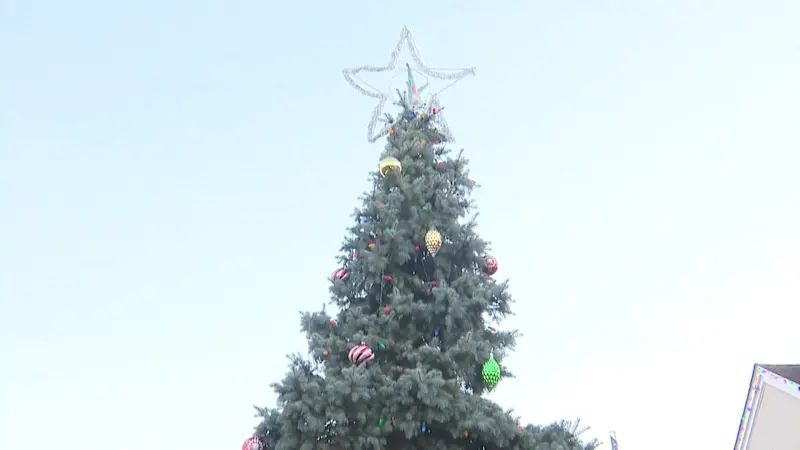 Story image: Santa Claus is coming to...Central Islip on a fire truck