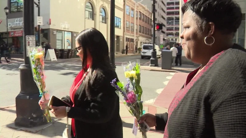 Story image: Society of American Florists gives out free flowers for 'Petal It Forward'