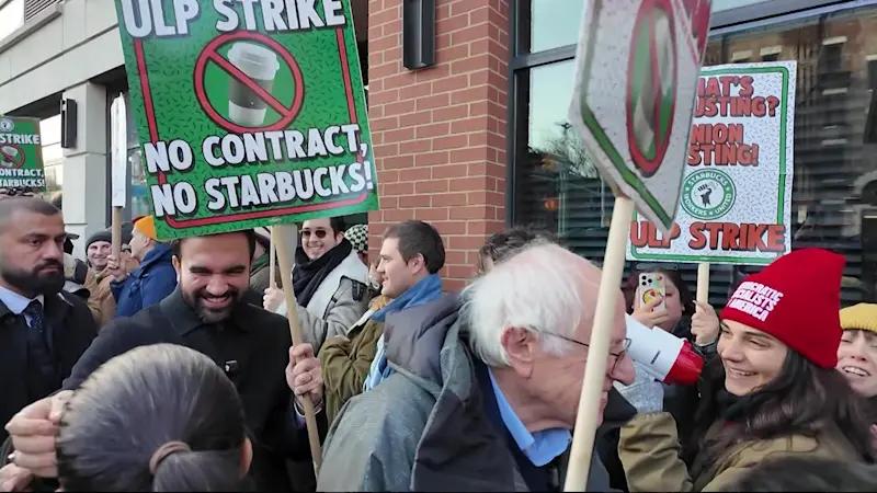 Story image: Starbucks workers, New Yorkers, Mayor-elect Zhoran Mamdani rally at Park Slope Starbucks