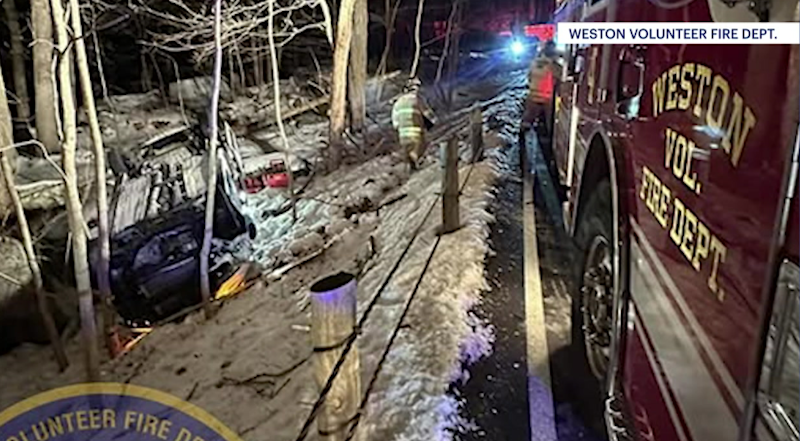 Story image: Car rolls down embankment in Weston