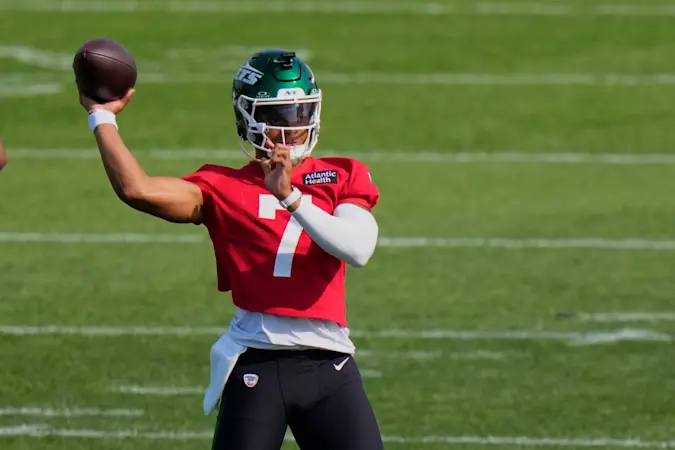 Story image: New York Jets quarterback Justin Fields carted off practice field with toe injury