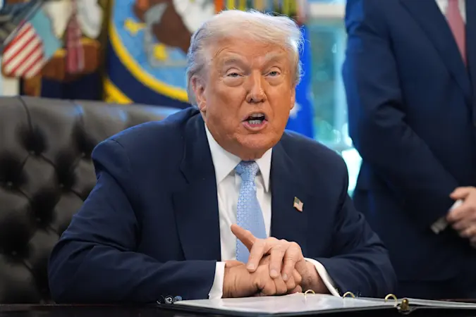 Story image: Trump signs bill to release Jeffrey Epstein case files after fighting it for months