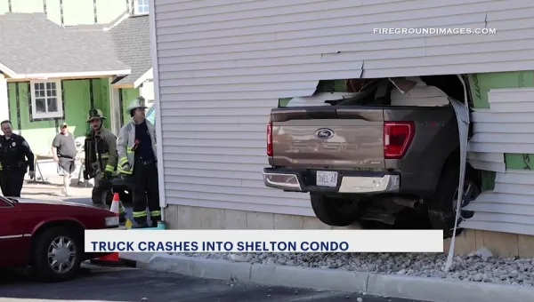 Firefighter injured when truck crashes into Shelton condo